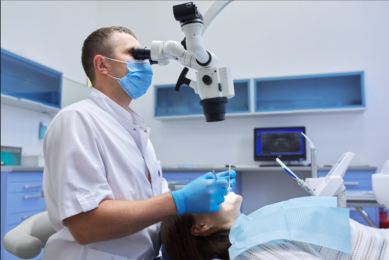 Doctor using machine for Treatment of Patient